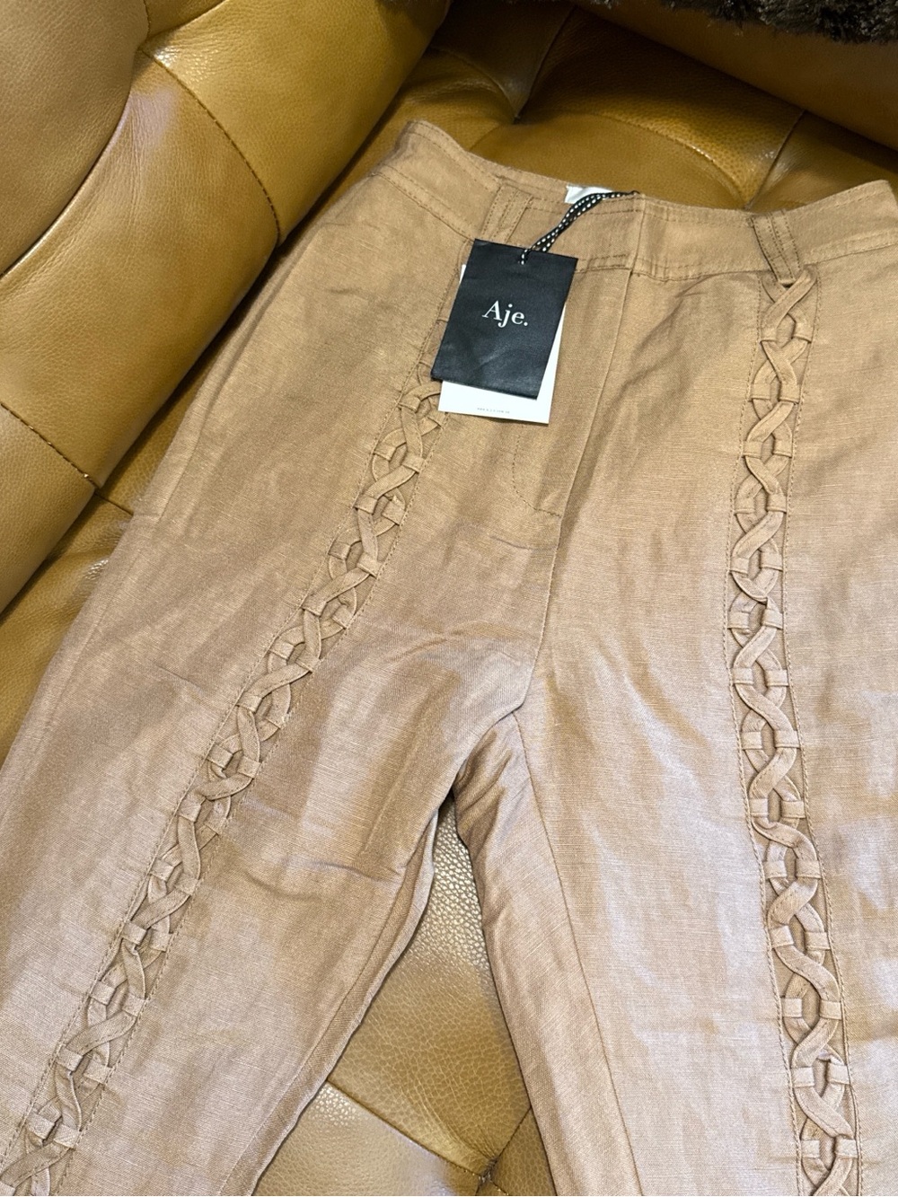 Aje. Braided-Trim Linen Pants in Light Brown